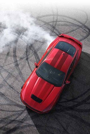 Overhead view of a 2024 Ford Mustang® model with tire tracks on pavement | Dick's Canby Ford in Canby OR