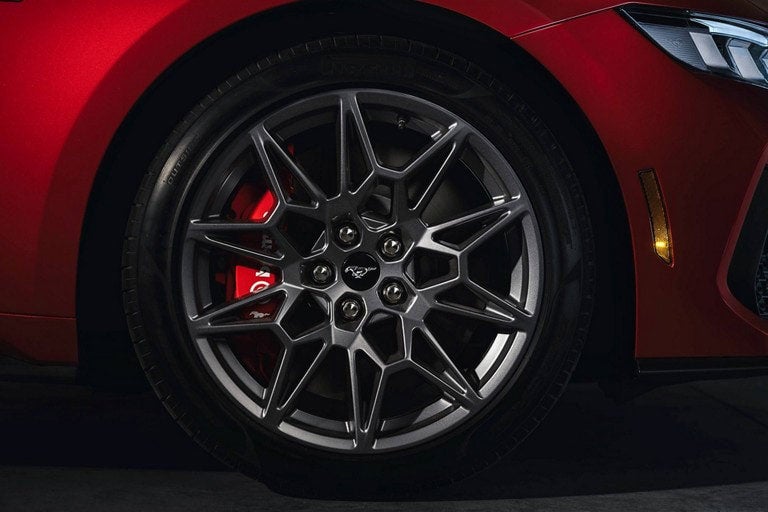 2024 Ford Mustang® model with a close-up of a wheel and brake caliper | Dick's Canby Ford in Canby OR