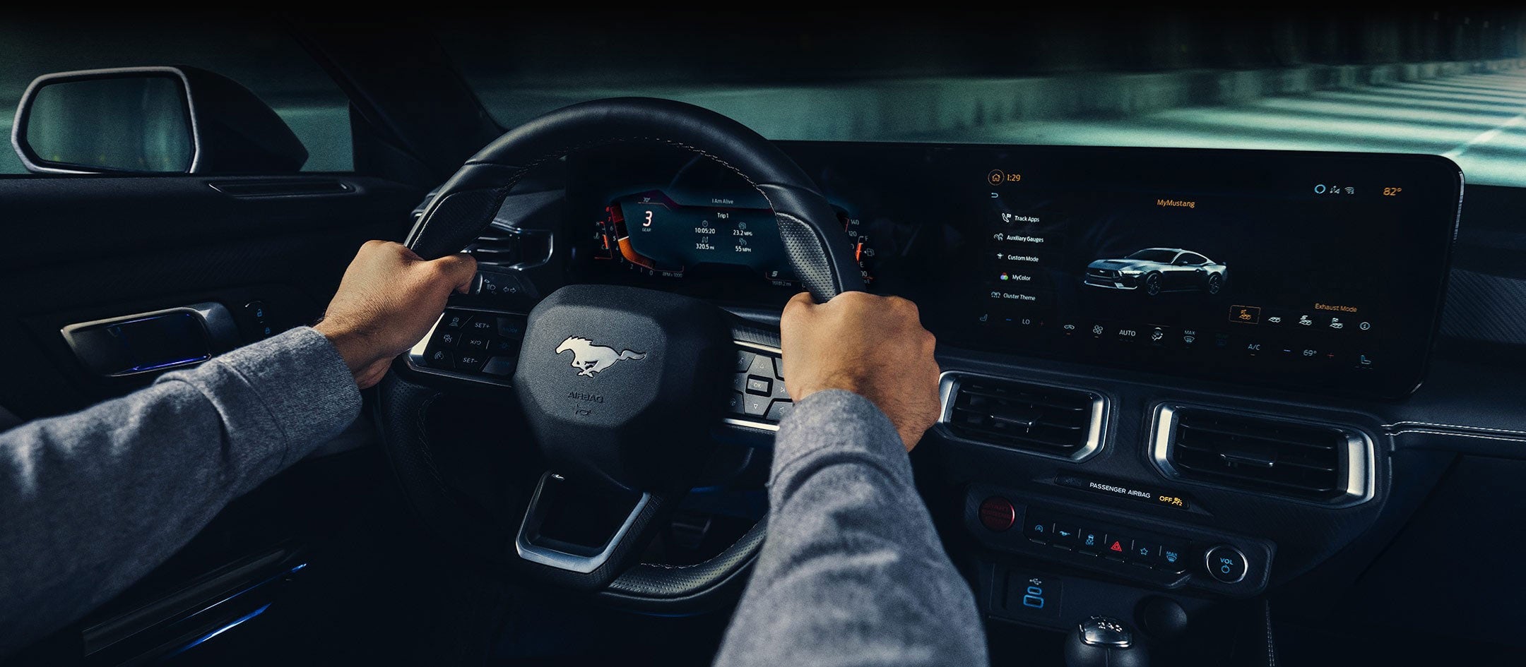 A 2024 Ford Mustang® model interior with a person driving | Dick's Canby Ford in Canby OR